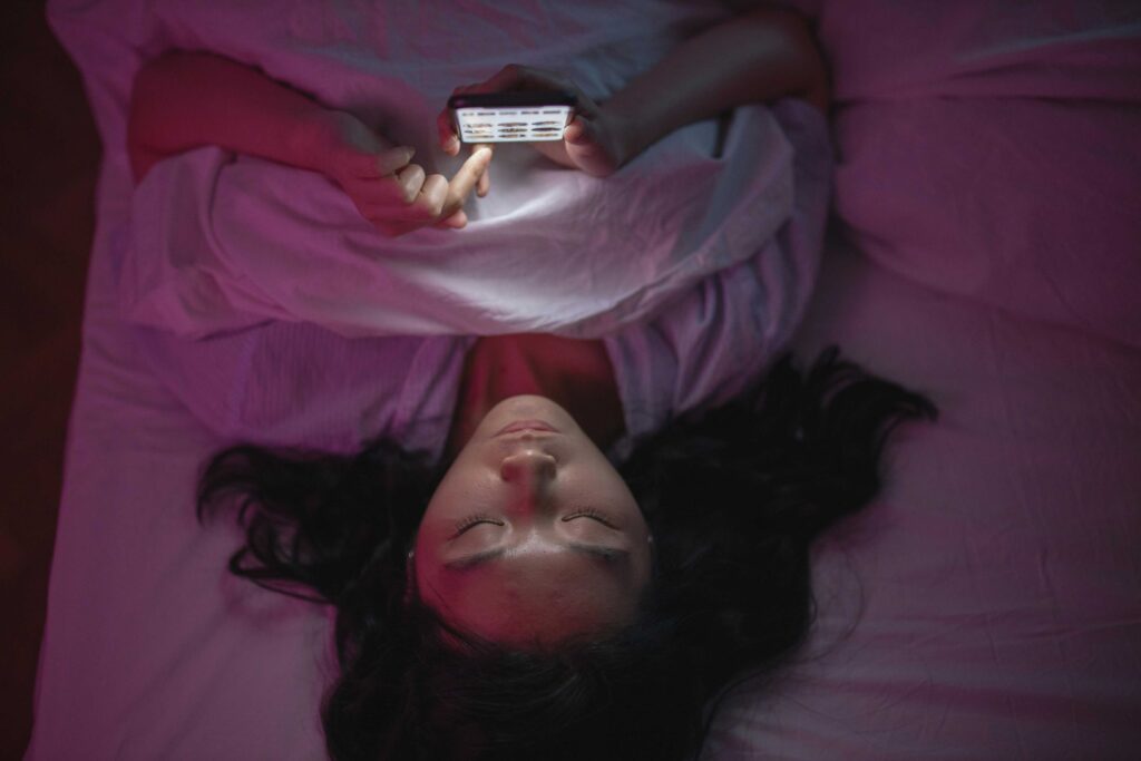 person using mobile for private video chat in Gurgaon at night